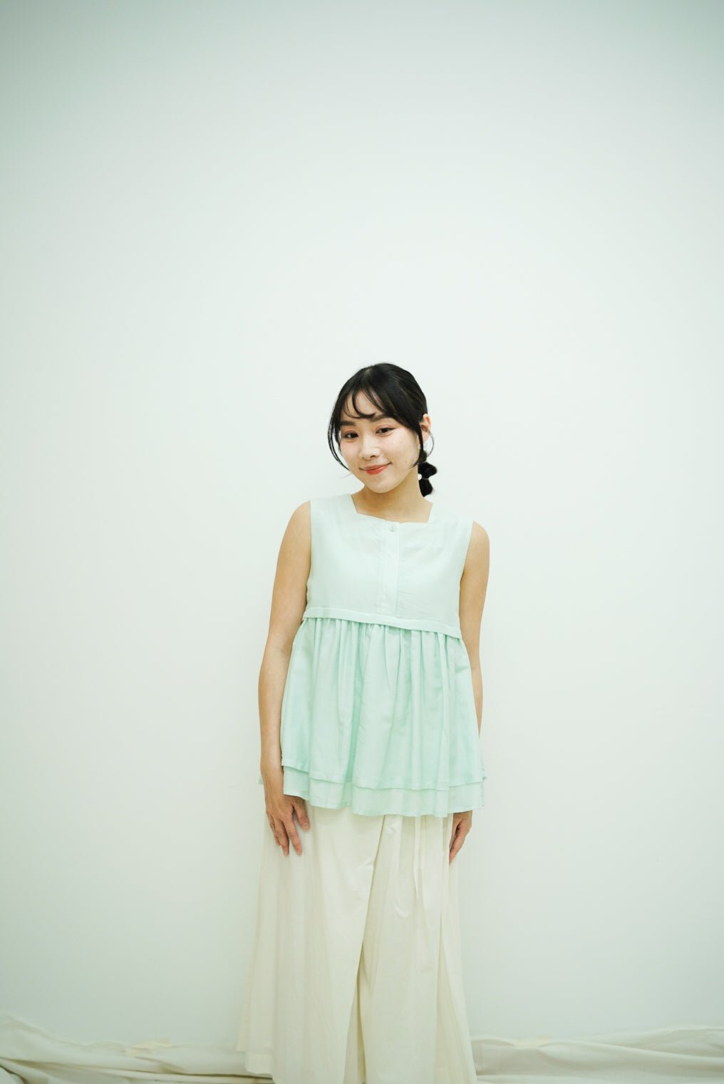 Norellie Vest (light greenish blue)