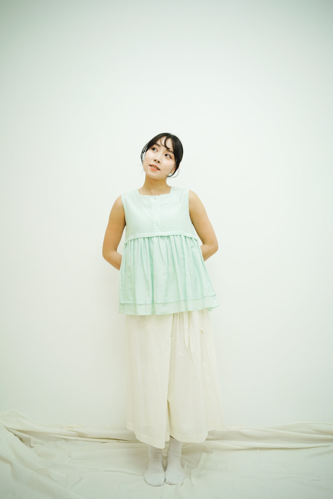 Norellie Vest (light greenish blue)