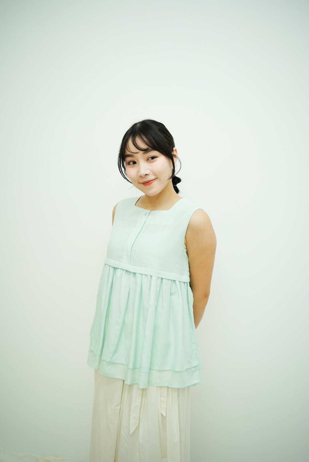 Norellie Vest (light greenish blue)
