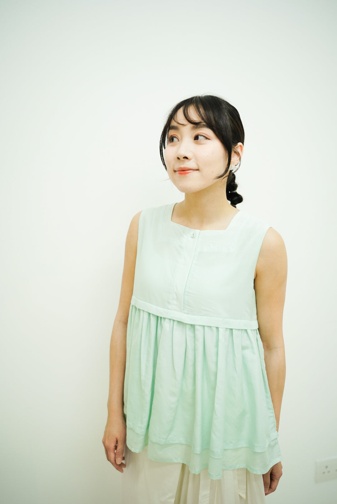 Norellie Vest (light greenish blue)