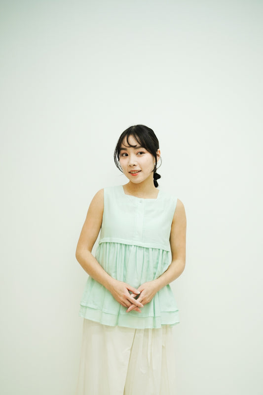 Norellie Vest (light greenish blue)